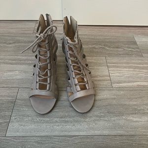 Gray lace up shoes.